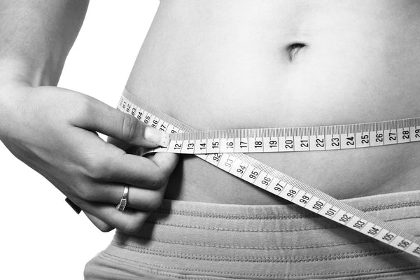 How to Have a Flat Stomach without Dieting or Working Out - Teatox Australia